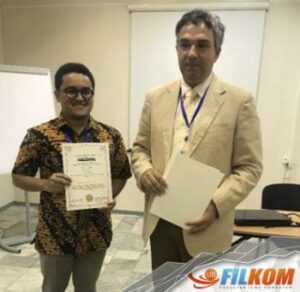 Dosen Teknik Komputer FILKOM Raih Best Presenter pada ICMSC 2018